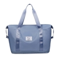 Large capacity blue travel duffle bag with bottom shoe compartment and wet dry separation - Blue