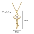 Detail of gold key pendant with fleur-de-lis crystal inlay, size 4.4cm by 1.7cm - Gold Key Necklace (G103)