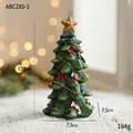 Mini green resin Christmas tree with gold star, red bows, and ornaments, 13.5cm tall - Large Christmas Tree