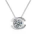 Macro shot of silver pendant featuring a brilliant round diamond in a C-shaped frame - Double C Necklace Xl-51
