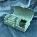 Detail view of the green velvet jewelry box with ring slots and golden snap fastener - Portable Arch Jewelry Box / Turquoise Green
