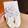 Detailed view of baby lace headband and ribbed socks set with large satin bows - (White) Ribbon Bow Set