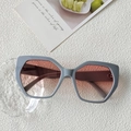 Geometric blue grey sunglasses with red gradient lenses on a minimalist white texture - Haze Blue