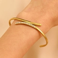 Retro 18K gold plated stainless steel crisscross cuff bracelet with sparkling zircon stones - Cross Streamline with Rhinestones (3093)