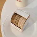 Macro view of seamless high-elastic hair ties in earth-toned gradient colors in a box - 1099E Coffee Gradient (5 Pcs Boxed)