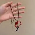 Collana con ciondolo Hello Kitty a fiocco rosso e cordino nero con nappe in metallo - Stile Svuotato Testa di Gatto Rosso / Rosso