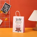 Pink birthday paper gift bag with white handle featuring cake illustration and polka dots - 605-4 (Pink Polka Dot Cake)