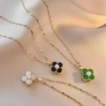 Rotating clover pendant necklaces in white, black, and green on gold steel chains - X0406 Black Rotating