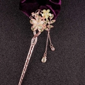 Elegant floral hair pin in rose gold finish with cat-eye stone petals and tassels - Rose Gold White Flower Green Gem Tassel (FZ039)