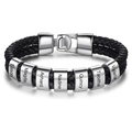 Macro shot of custom stainless steel beads with names on double-layer black braided leather band - Steel Clasp - 7 Names