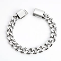 Bracelet gourmette unisexe en acier inoxydable argenté poli sur fond blanc immaculé - Acier Inoxydable-21cm