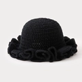 Handcrafted black crochet knit bucket hat with elegant ruffled brim and texture - One Size / Black