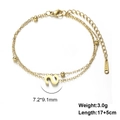 Detail of gold double-layer stainless steel bracelet with S pendant and metal beads - Letter-S / Gold