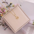 Macro detail of 18K gold Libra zodiac pendant featuring sparkling zircon micro-pave setting - 7#Libra