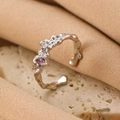 Adjustable silver bow ring with purple zircon and irregular molten texture - Silver Purple Lava Zirconia Ring (4229)