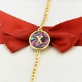 Gold-plated Figaro bracelet with round abalone shell pendant featuring letter X inlay - Letter X