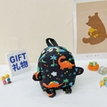 Kids black backpack with colorful dinosaur prints and cute decorative side wings - Black