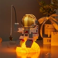 Glow-in-the-dark astronaut building block pen holder with warm LED light effect - 16801 Fishing Astronaut with Light