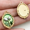French retro enamel flower pendant in green with pearl accents and embossed gold edges - Green Oval Pearl Flower Pendant-19558