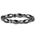 Detail of magnetic hematite beads bracelet with polished oval and hexagonal stones - White Snowflake Bracelet