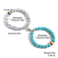Matching magnetic couple beaded bracelets with rainbow accents and heart charm in blue and white - Blue White Turquoise Beads Rainbow Bead Bracelet