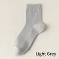 Breathable cotton crew sock in light grey featuring a specialized mesh texture - One Size / Light Gray