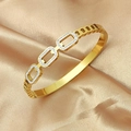 Detailed close-up of a gold titanium bracelet with crystal pavé on champagne satin fabric - Z109a Diamond-set Bangle With Buckle Gold