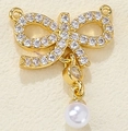 Golden bow pendant with white cubic zirconia and a round white pearl charm - Pearl Drop Bowknot-ZTP0065