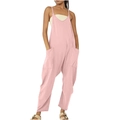 Detailed view of pink jumpsuit showing functional large side pockets and loose fit cut - Pink