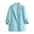 Detail view of light blue blazer with rolled sleeves and decorative gold buttons - S / Light Blue
