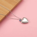 Hartvormige medaillon ketting van 316L staal in zilver met een blauwe geboortesteen - Lichtblauw