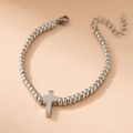 Pulsera mínima de acero inoxidable con cuentas de 4mm y colgante de cruz plateado - Plateado
