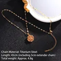 Collana a quadrifoglio rotante in acciaio al titanio dorato con zirconi rossi - Stile Rotante 1/Quadrifoglio Rosso