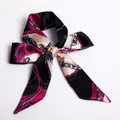 Elegant silk-like scarf ribbon with pink chain pattern tied in a bow on white background - S19-Black Rose Red Chain Heart