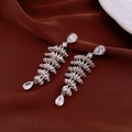 Detailed macro view of silver water drop earrings with zircons on silk background - Silver Long Water Drop Tassel Style (WE2027)