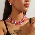 Detail of a luxury jewelry set featuring pink rectangle crystals on a gold chain necklace - Rectangle Pink Purple Crystal + Earrings