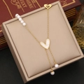 Detail of a gold double-layer necklace with pearl tassels and heart pendant in a gift box - Pearl Tassel Heart Style (3#)