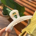 Elegant 13.5cm hollow butterfly hair claw in cream white with a pearlescent finish - Jelly White