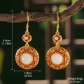 Detail view of oriental earrings with white faux jade and colorful enamel hanging on a branch - Retro Artificial Pearl Inlaid (GF0239)
