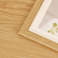 Nordic minimalist light wood frame with cream mat board and botanical art detail - Natural Wood Color