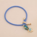 Bracelet tressé bleu avec pendentif poisson doré et fermoir en métal de luxe ajustable - Pendentif Poisson d'Or Bleu / Bleu