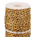 Golden and black oval link stainless steel Cuban chain on a white spool roll - 1 Meter / Black