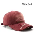 Distressed wine red cotton baseball cap featuring vintage New York embroidery details - Burgundy