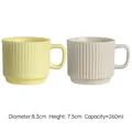 Pale yellow and off-white striped ceramic mug set with matte vertical ribbed texture - Set of 2 (Yellow + Off-white)
