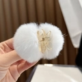White faux fur pom-pom hair claw clip with golden metal spring for sweet winter styling - White