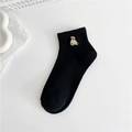 Black women's cotton crew sock featuring a beige bear embroidery and soft texture - Black - Bear