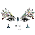 Macro detail of YT-165 iridescent AB acrylic face gems and eye rhinestones for party makeup - Gorgeous Symmetrical Brow Eye Sticker (YT-165)