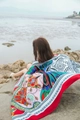 Red Bohemian style oversized beach scarf with vibrant ethnic patterns on a sunny coast - Multicolor Bohemian Round Style / Dark Red / 180cm