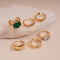 Set of 6 gold vintage rings with green emerald, clear gem, and pink zircon on white stone - Gold (6-Piece Set)