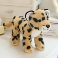 Realistic standing leopard plush toy with spotted beige fur and lifelike facial details - Leopard